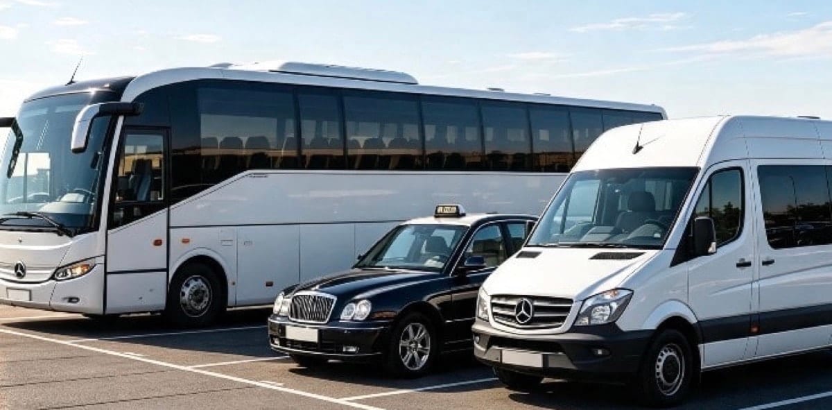 Black Country Travel coach and executive car at sunset